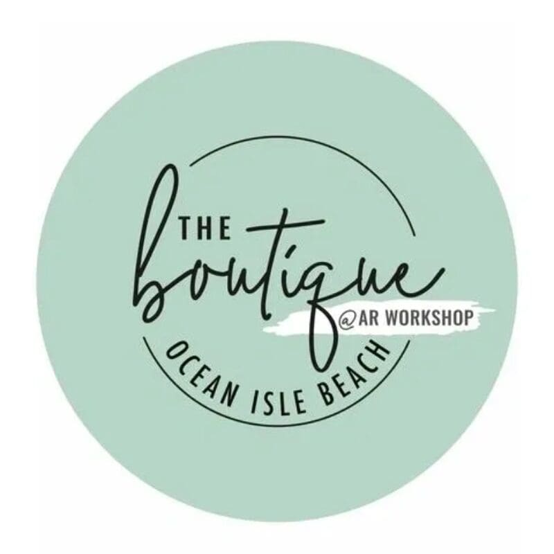 A circle with the words " the boutique ocean isle beach."