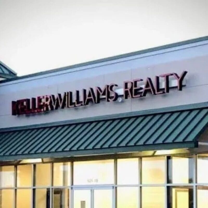 A building with the words " keller williams realty " on it.